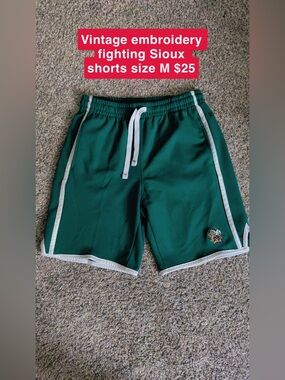 Green Athletic Shorts with White Trim - Fighting Sioux Logo